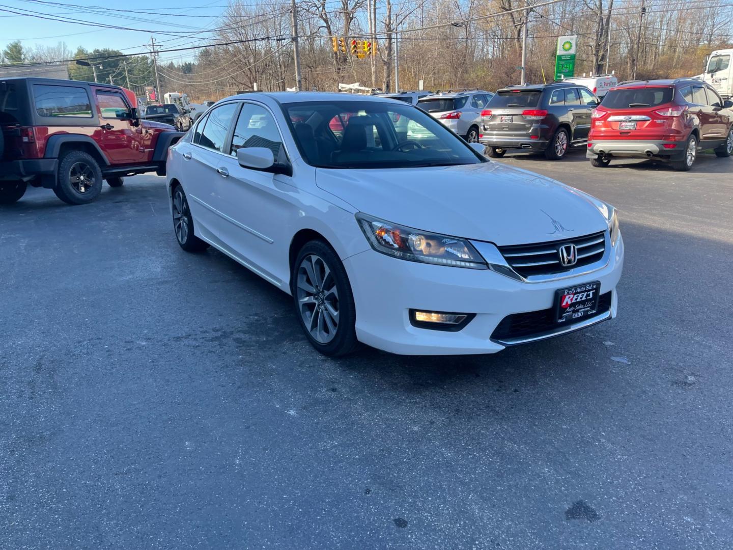 2013 White /Black Honda Accord Sport (1HGCR2F50DA) with an 2.4L I4 DOHC 16V engine, Automatic transmission, located at 547 E. Main St., Orwell, OH, 44076, (440) 437-5893, 41.535435, -80.847855 - This 2013 Honda Accord Sport CVT is a reliable and fuel-efficient sedan. It is powered by a 2.4-liter four-cylinder engine that produces 189 horsepower. The CVT (continuously variable transmission) provides smooth and efficient acceleration. The Accord Sport CVT comes equipped with features such as - Photo#2